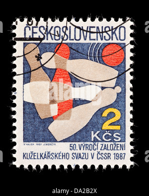 Postage stamp from Czechoslovakia showing bowling pins and ball, for the 50'th anniversary of the Czechoslovakian Bowling Union. Stock Photo