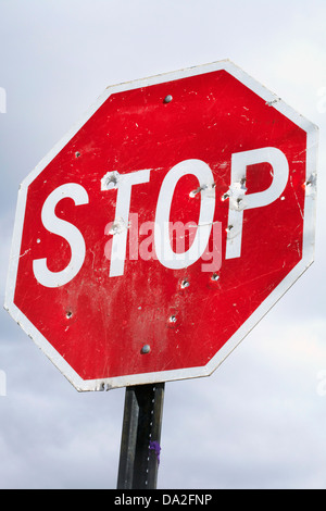 Stop Sign with bullet holes Stock Photo - Alamy