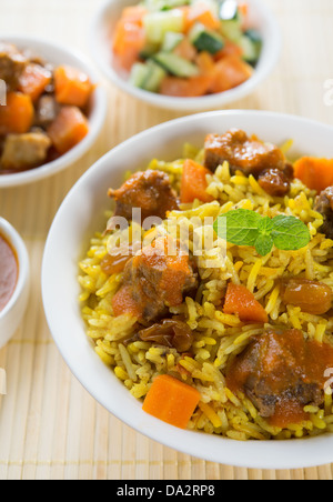 Arab rice, rice with meat and carrot in a bowl. Middle eastern food. Stock Photo