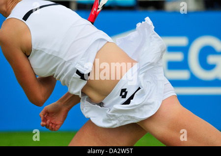 Ekaterina Makarova (Russia) moving forward after serving at Eastbourne 2013 Stock Photo
