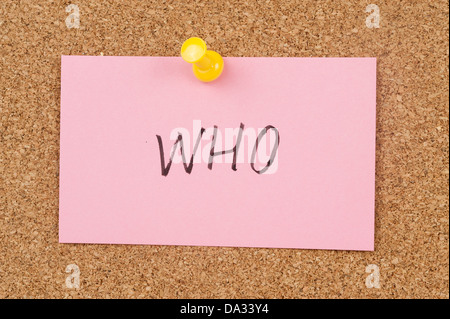 Who word written on paper and pinned on cork board Stock Photo
