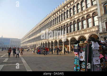One of the outdoor souvenir stands in front of the Procuratie Vecchie in St Marks Square or Piazza San  Marco Venice Italy Stock Photo