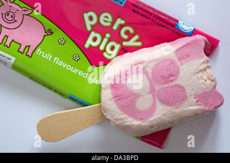 Percy Pig fruit flavoured ice cream lolly with lolly out of wrapper set on white background Stock Photo
