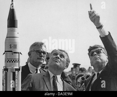 President John F. Kennedy Cape Canaveral Saturn V launch with Dr. Wernher von Braun, center 1963 Stock Photo