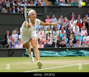 Wimbledon, London, UK. 02nd July, 2013. Day Eight of the The Wimbledon Tennis Championships 2013 held at The All England Lawn Tennis and Croquet Club, London, England, UK. Petra Kvitova (CZE) against Kristen Flipkens (Bel) Credit:  Action Plus Sports Images/Alamy Live News Stock Photo