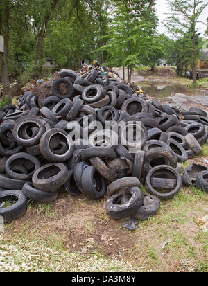 Hundreds of tires await disposal as the Detroit Blight Authority cleans up 14 blocks of the Brightmoor neighborhood. Stock Photo