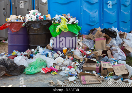 Full bins and rubbish after Glastonbury Festival 2013 Stock Photo