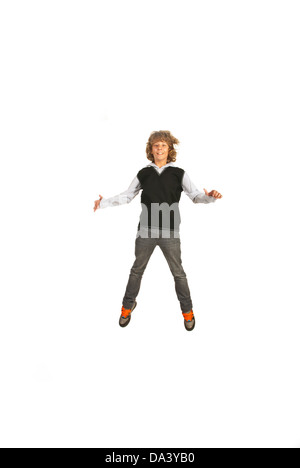 Teen boy jumping isolated on white background Stock Photo