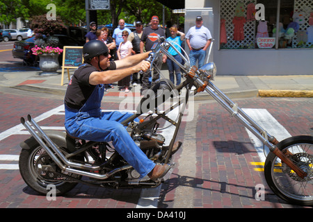 Georgia,Thomasville,downtown,South Broad Street,man men male adult adults,motorcycle motorcycles,motorcyclist,Harley-Davidson,visitors travel travelin Stock Photo