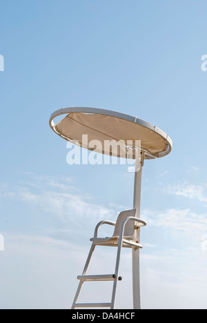 Lifeguard post on blue sky background Stock Photo
