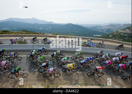 Marseille, France. 03rd July, 2013. The Peloton descend the Col de la Gineste with Marseille as a back drop during stage 5 of the Tour De France Cagnes-sur-Mer to Marseille. Credit:  Action Plus Sports/Alamy Live News Stock Photo