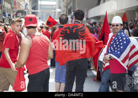 Albanian Americans show their national & ethnic pride marching in the International Immigrants Day Parade in New York City. Stock Photo