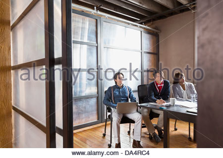 Group of entrepreneurs in meeting in creative office space