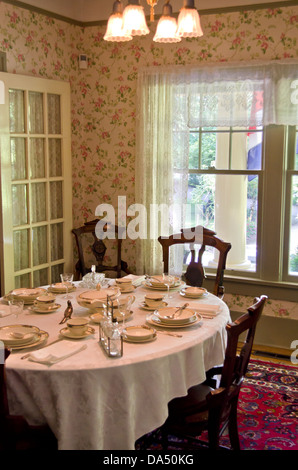 Antique dining room setting recreated in 1920s style, near Vancouver Canada. Stock Photo