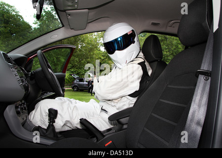 The Stig in a car. Stock Photo