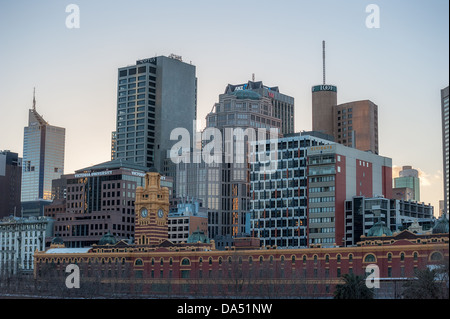 A close up of a cluster of buildings including Flinders Street station in downtown Melbourne, Australia. Stock Photo