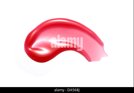 red lip gloss sweep cut out onto a white background Stock Photo