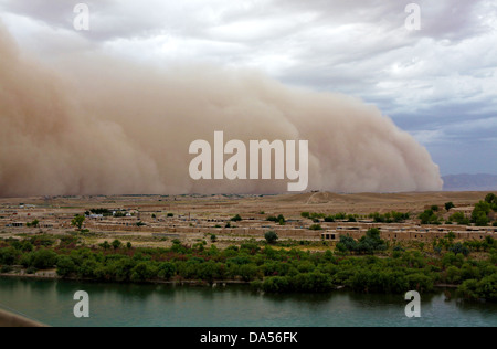 A massive dust storm rolls through the Kajaki Bazaar June 3, 2013 in Zeebruge, Helmand province, Afghanistan.
