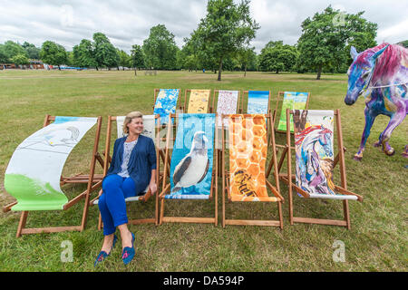 London, UK. 04th July, 2013. Deckchair Dreams is being launched ahead of the forthcoming British Summertime in Hyde Park series of concerts. Pegasus (based on Ronnie Wood’s painting of the same name R) is one of  is one of 20 new designs by people including Harry Enfield (Hello Ducks), Miranda Richardson (Blue with bird C), Julia Bradbury (Bee stripes), Take That’s Howard Donald (Rainbow hands L), Chris Beardshaw and Michael Craig-Martin (Pink bananas). Pegasus was brought to life by Tetua who was hand painted for the occasion.