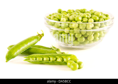 Green peas in glass bowl Stock Photo