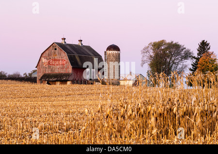 Red barn with Sugardale Farms logo and corn field. Stock Photo