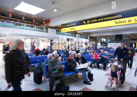 Gatwick airport departure lounge and direction signs Stock Photo