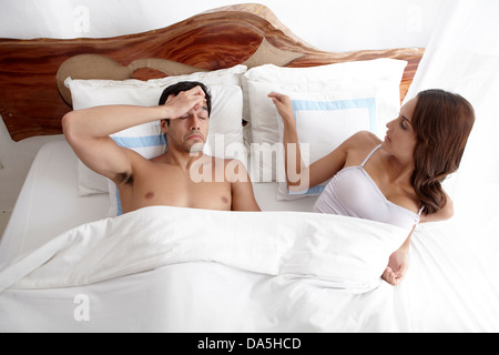 A couple in bed together. Stock Photo
