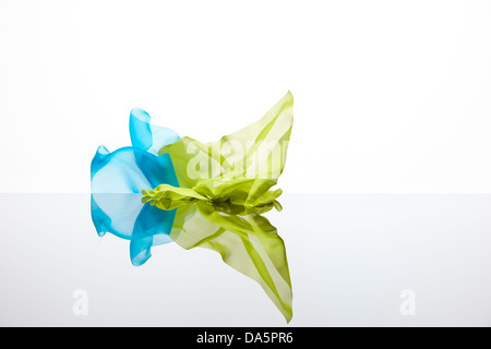 chiffon floating fabric blowing wind falling frozen pretty shapes Stock Photo