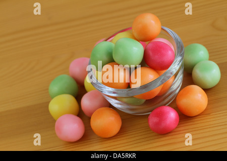 Colorful candy in little glass bowl with copy space Stock Photo