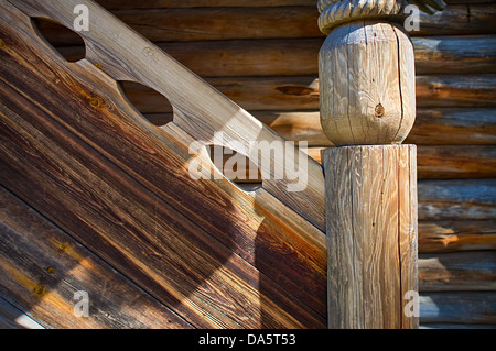 Porch of Old Russian northen log house Stock Photo