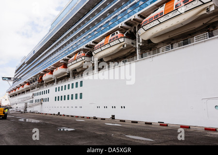 Lifeboats on the side of the Caribbean Princess cruise liner, operated by Princess Cruises Stock Photo