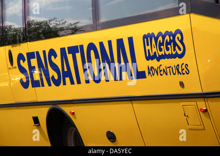 Sensational Haggis adventures yellow tour bus Stock Photo