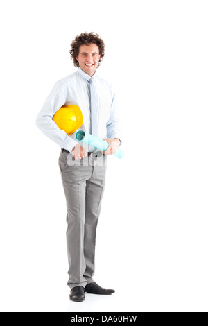 Studio shot of young handsome architect holding blueprints on white background. Looking at camera. Stock Photo