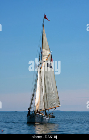 The passenger cruise schooner Timberwind sailing in Penobscot Bay outside the breakwater at Rockland Maine, bow view Stock Photo