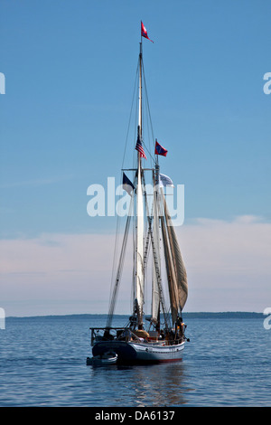 The passenger cruise schooner Timberwind sailing in Penobscot Bay outside the breakwater at Rockland Maine, stern and starboard Stock Photo