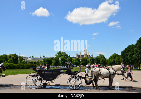 The fiakers, horse-drawn carriages, which have transported people round Vienna for centuries, are still popular with tourists. Stock Photo