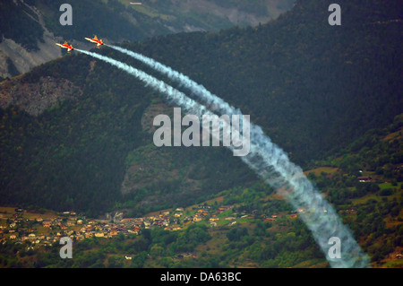 SION, SWITZERLAND, Swiss airforce team making an inverted bank at the Breitling Air show.  September 17, 2011 in Sion, Switzerla Stock Photo