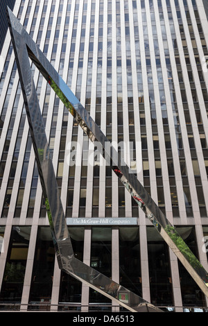 'McGraw-Hill Building', 1221 Avenue of the Americas with  Athelstan Spilhaus' Large Metal Triangle Artwork, NYC, USA Stock Photo