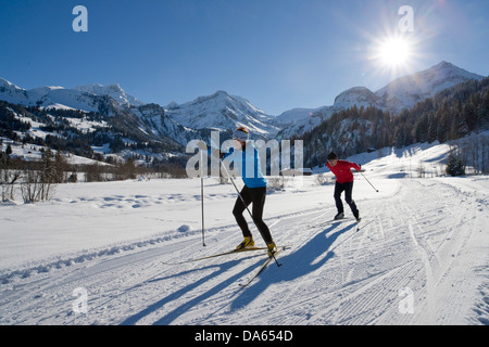 cross-country, ski, Lauenen, winter, village, canton, Bern, Bernese Oberland, cross-country, ski, Switzerland, Europe, couple, s Stock Photo