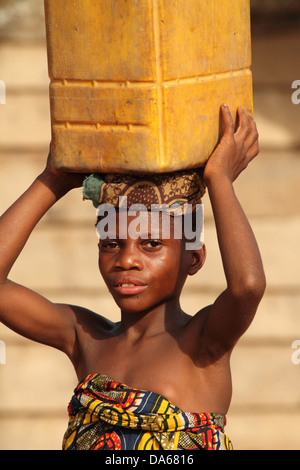 ethnic, minority, indigenous, person, pygmies, pygmy, Baka pygmy, Baka pygmy girl, water, jerry can, front view portrait, Sangha Stock Photo