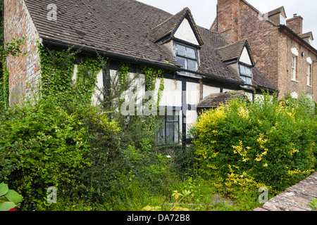 Timber framed cottage in need of renovation, Gloucestershire, England, UK Stock Photo