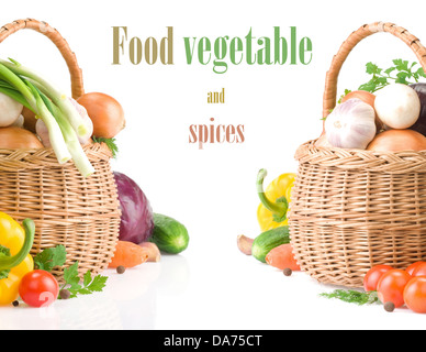 fresh vegetables and green leaves in basket isolated on white background Stock Photo