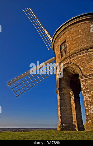 Chesterton Windmill, Warwickshire landmark, stone vaulted structure underneath and white timber latticed sails Stock Photo