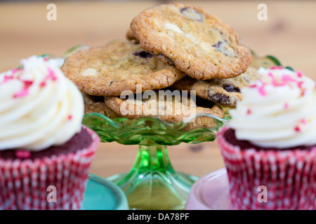 Chocolate chip cookies and red velvet cupcakes Stock Photo