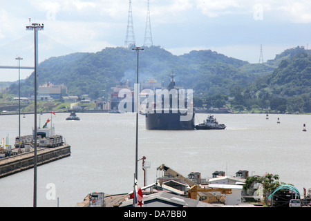 Cargo ship transiting through the Miraflores Locks, Panama Canal, Pacific Ocean side. Stock Photo