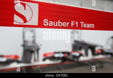 Nuerburg, Germany. 06th July, 2013. The logo of Sauber seen during the third practice session at the Nuerburgring circuit in Nuerburg, Germany, 06 July 2013. The Formula One Grand Prix of Germany will take place on 07 July 2013. Photo: Jens Buettner/dpa/Alamy Live News Stock Photo