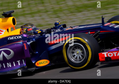 Nuerburg, Germany. 06th July, 2013. German Formula One driver Sebastian Vettel of Nuerburg, Germany, 06 July 2013. The Formula One Grand Prix of Germany will take place on 07 July 2013. Photo: David Ebener/dpa/Alamy Live News Stock Photo