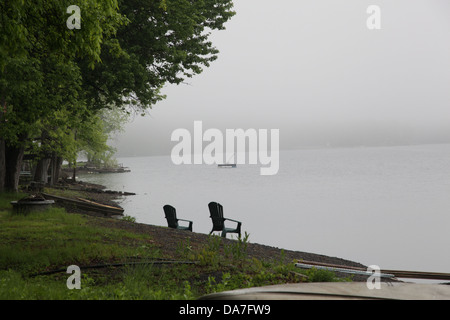 Foggy Summer day at Thompson's lake Stock Photo