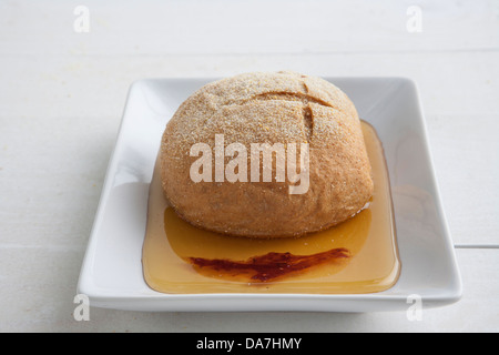 homemade loaf of bread and olive oil Stock Photo