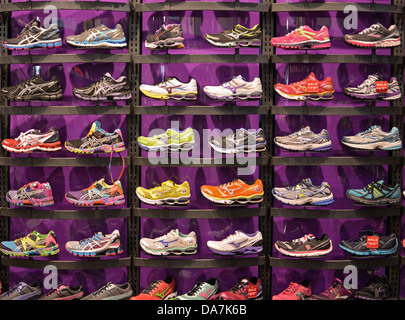 Men's athletic shoes for sale at a Foot Locker store on 14th Street in Downtown Manhattan, New York City Stock Photo